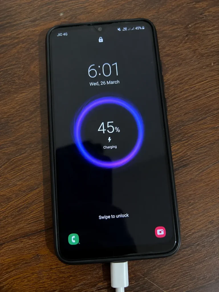 Android phone showing charging status on screen